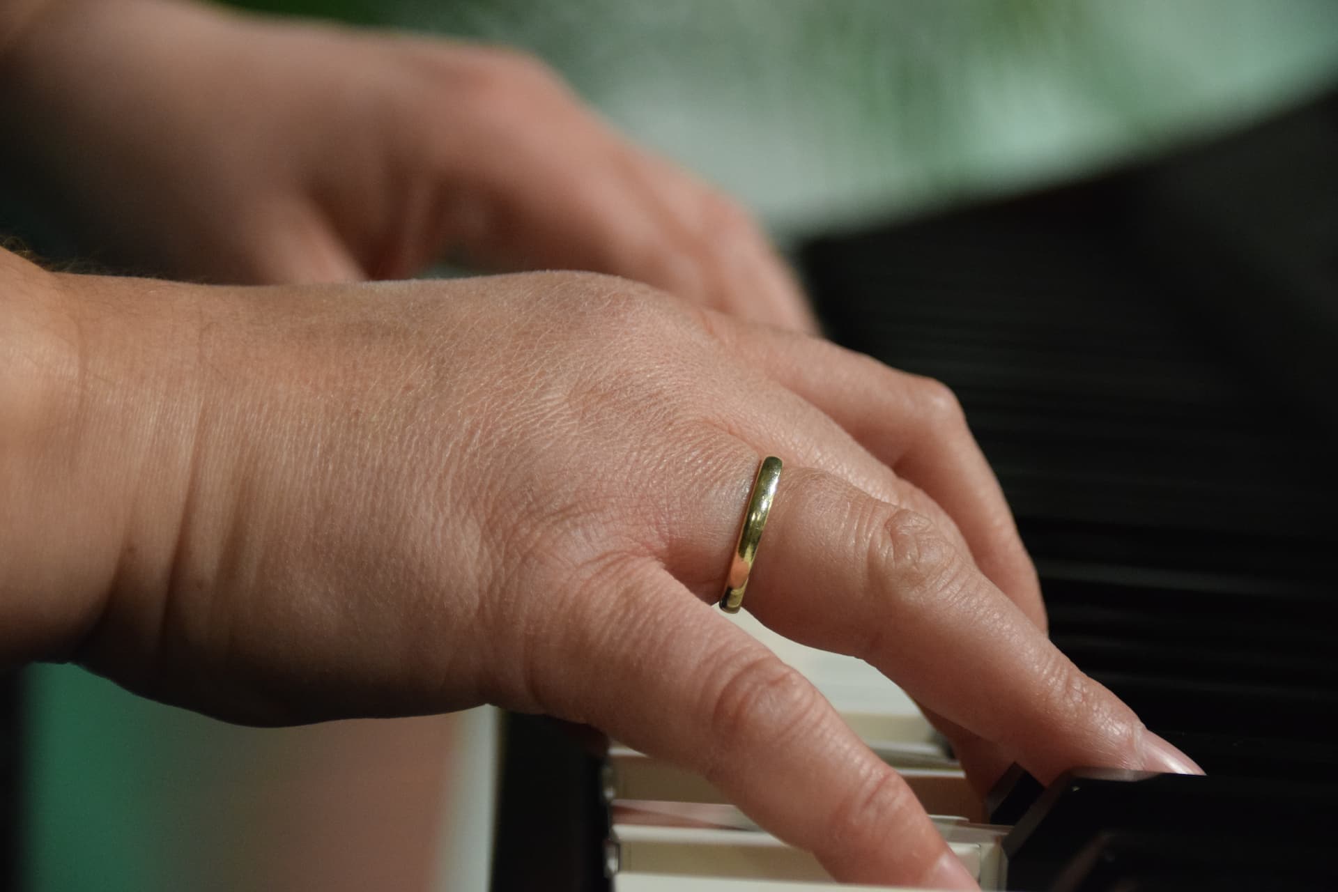 Hand Playing Piano